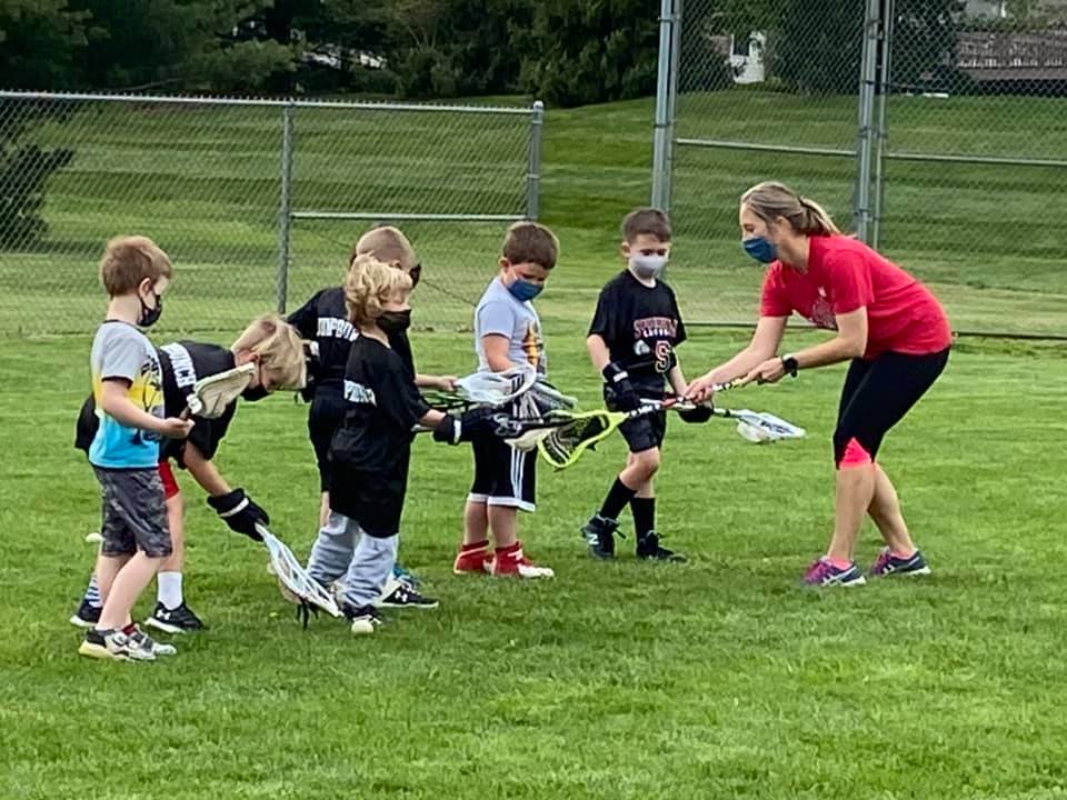 Coach May works with our youngest players to develop the early basics.